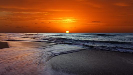 日落橙色海滩海洋宽手机壁纸