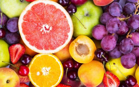 五颜六色的水果，浆果，橙子，葡萄，葡萄柚墙纸