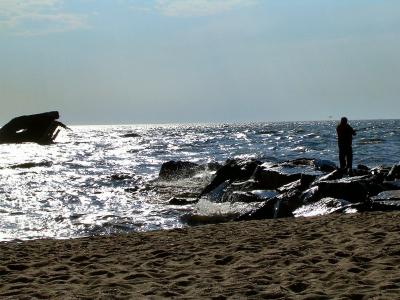 日落海滩的渔夫在开普梅新泽西州壁纸