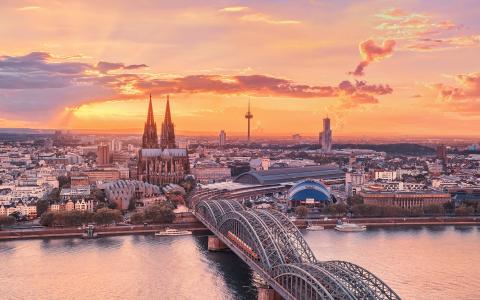 城市景观，科隆，德国，夕阳的天空，莱茵河，桥梁，建筑物的壁纸