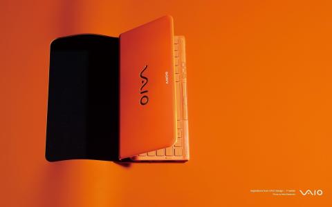 索尼，橙色笔记本电脑，橙色背景