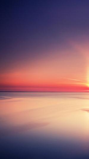 平静的海面美丽的日落iPhone 5壁纸