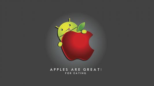 Android的吉祥物吃苹果高清壁纸