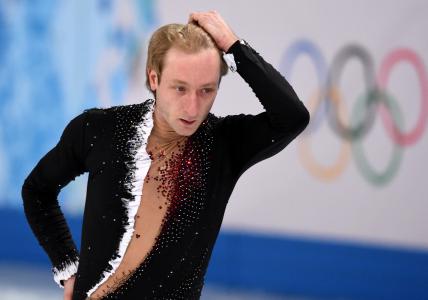 在索契举行金牌的俄罗斯花式滑冰运动员Evgeny Plushenko