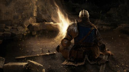 在游戏“黑暗之魂”中靠近火焰的盔甲中的士兵
