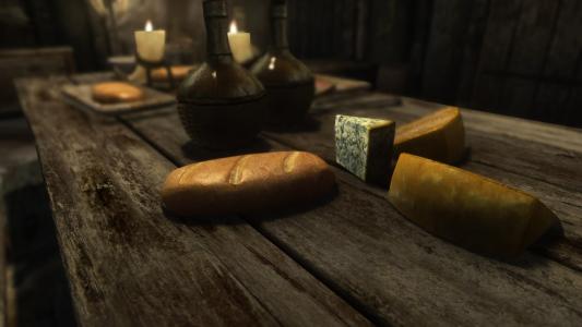 面包和在桌子上的奶酪块在游戏中